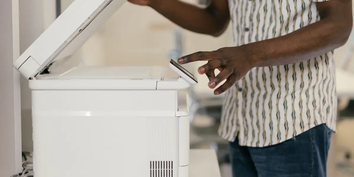 Person operating copy machine